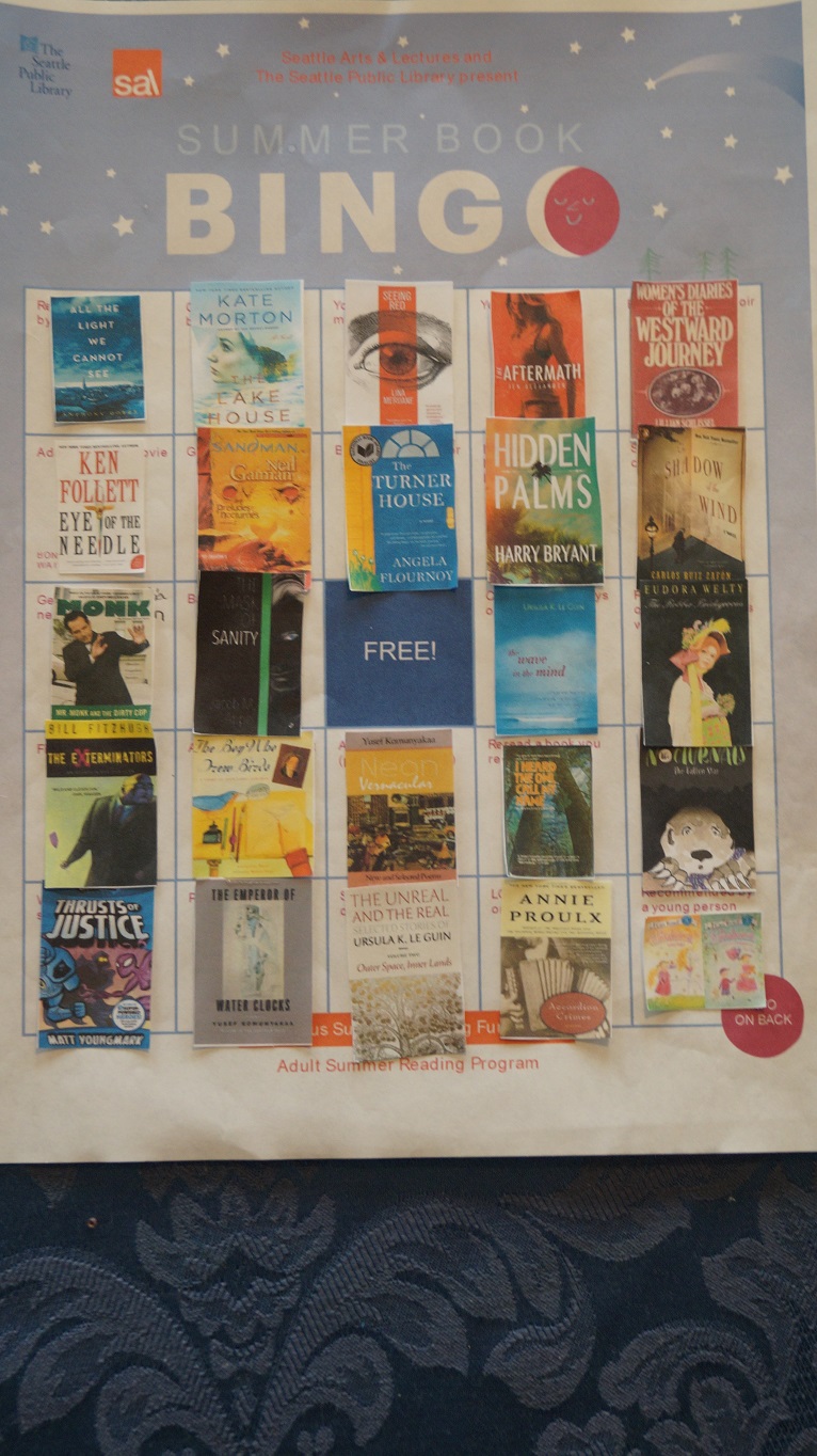 A Summer Book Bingo Blackout! Each square is filled in with a cut out picture of the book cover.