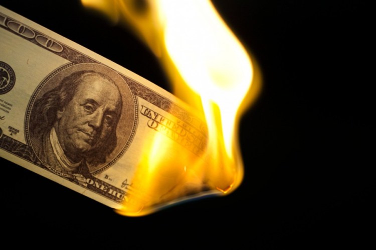 iStock_000013284658_Small burning money