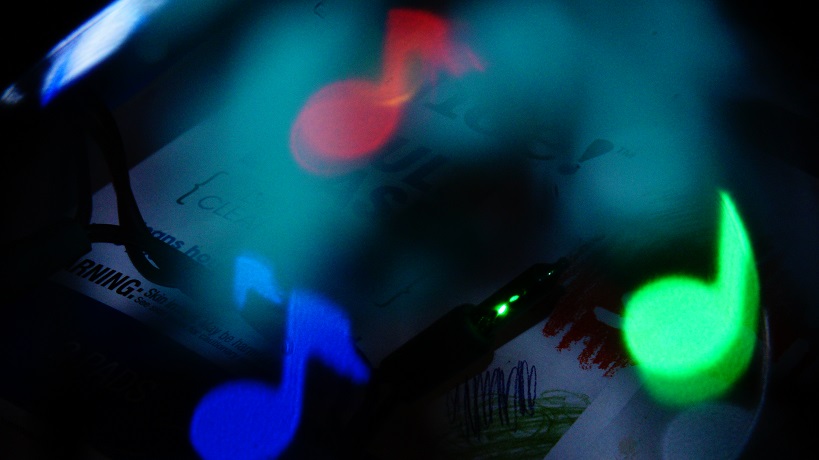 Bokeh notes over some stain cleaning pads in the junk drawer.