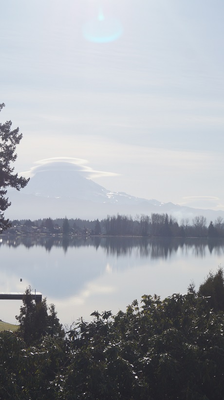 Photograph of Mt. Rainier and its reflection in the lake.